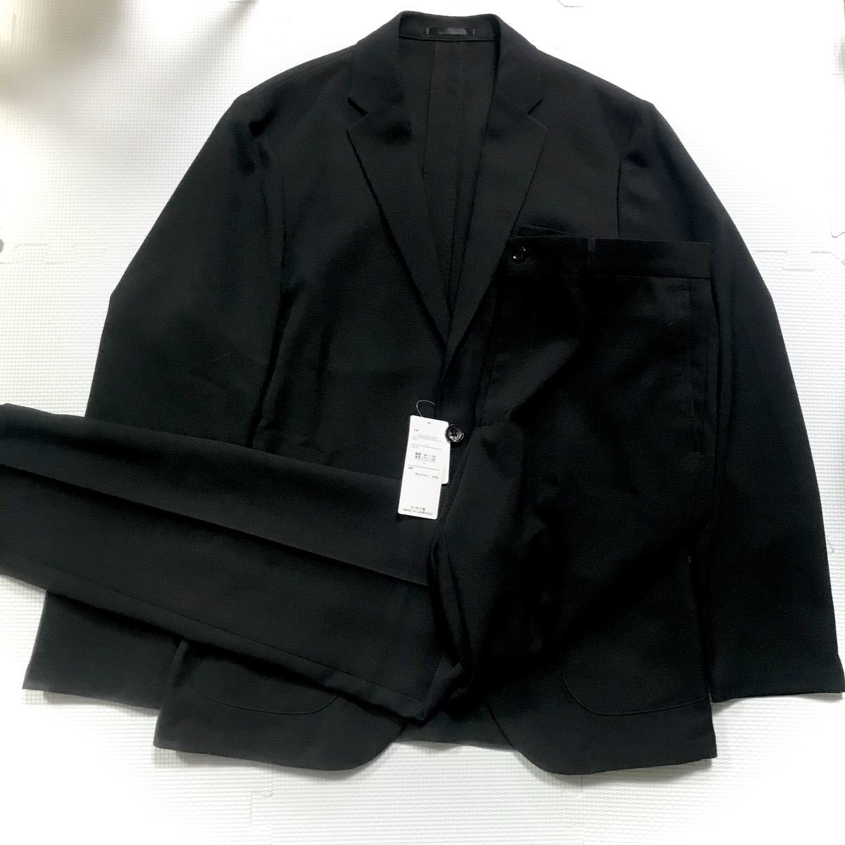 新品　タグ付き　スーツ上下セット　メンズLサイズ　黒色　イオン_画像1