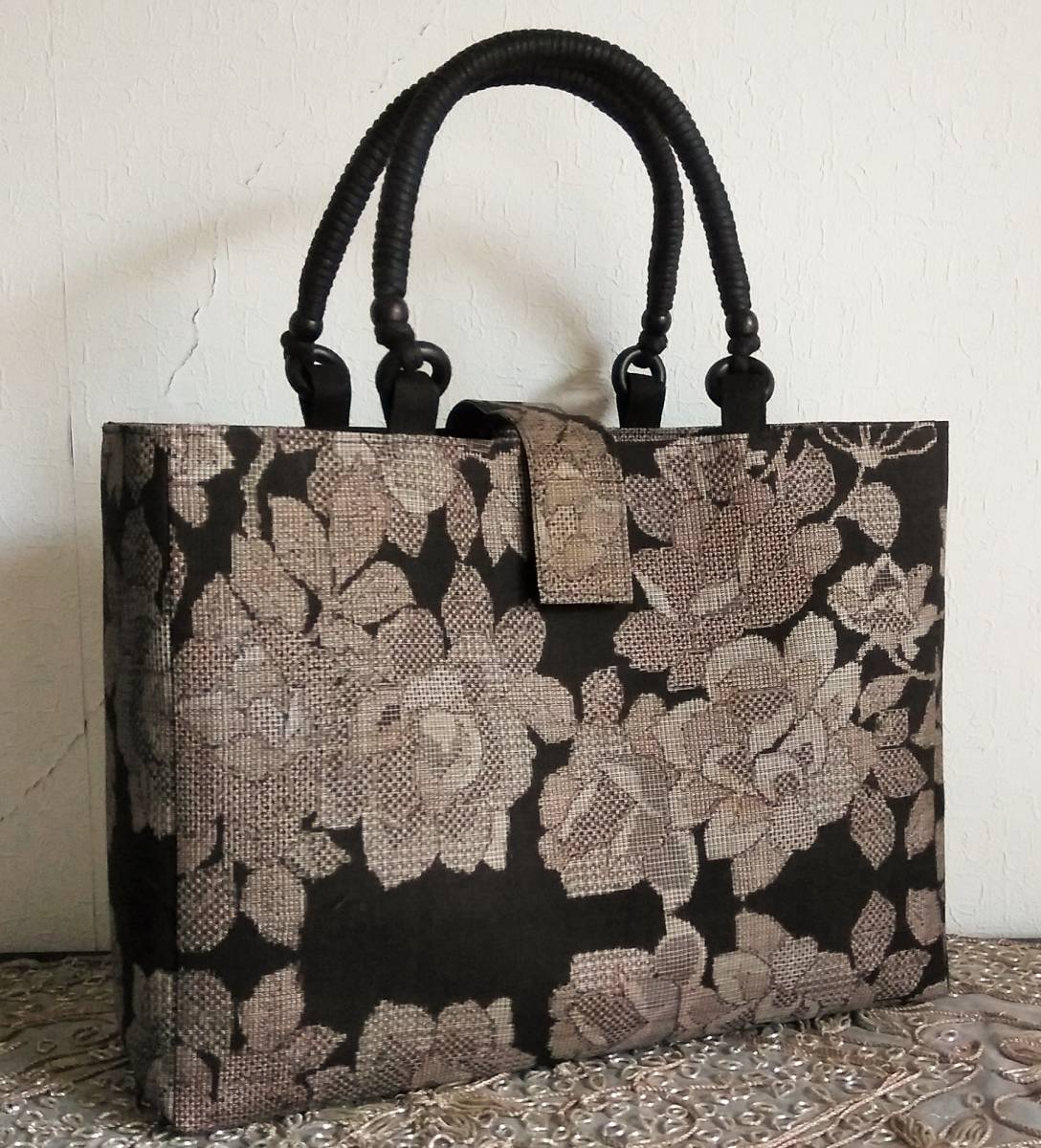 203mt37極上逸品○最高級 本場大島紬 竹かご 花菱 割り込み絣○美品