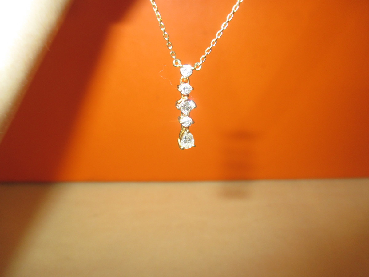 本物保証【即決で送料無料】良品/天然のダイヤモンド/0.56ct/イエロー
