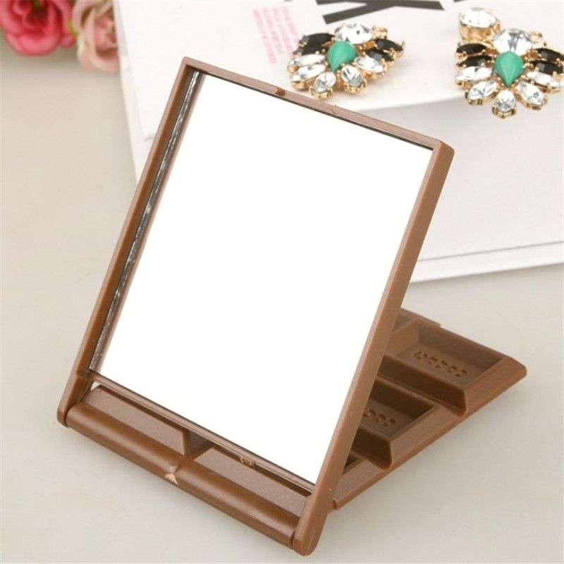  compact mirror ... seems to be . chocolate type board chocolate ( light brown, small size )