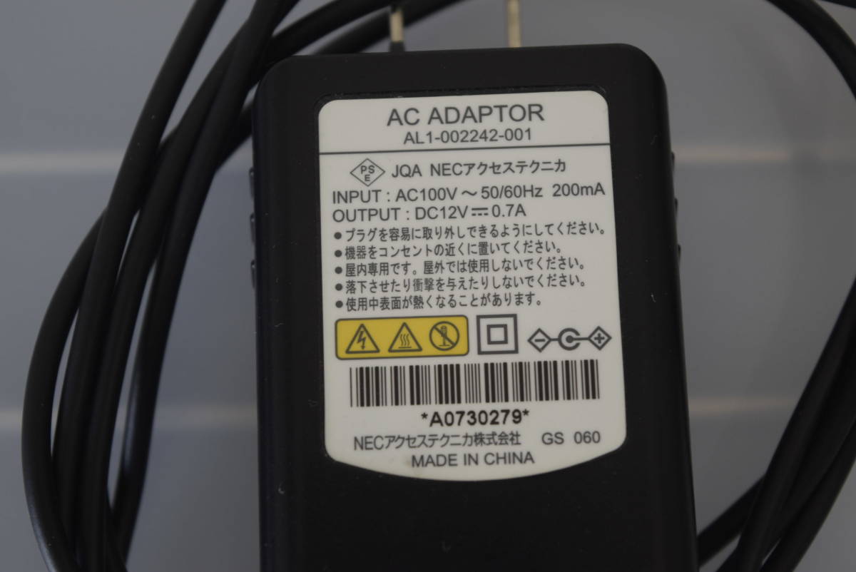  used NEC AC adaptor AL1-002242-001 12V 0.7A central piller n equipped 