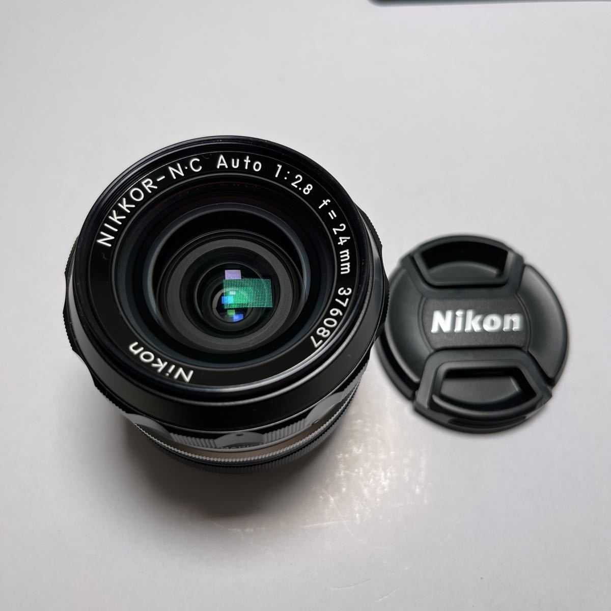 ⑦ニコン　NIKKOR-N C 24mm F2.8カメラレンズ　　　★送料無料★_画像1