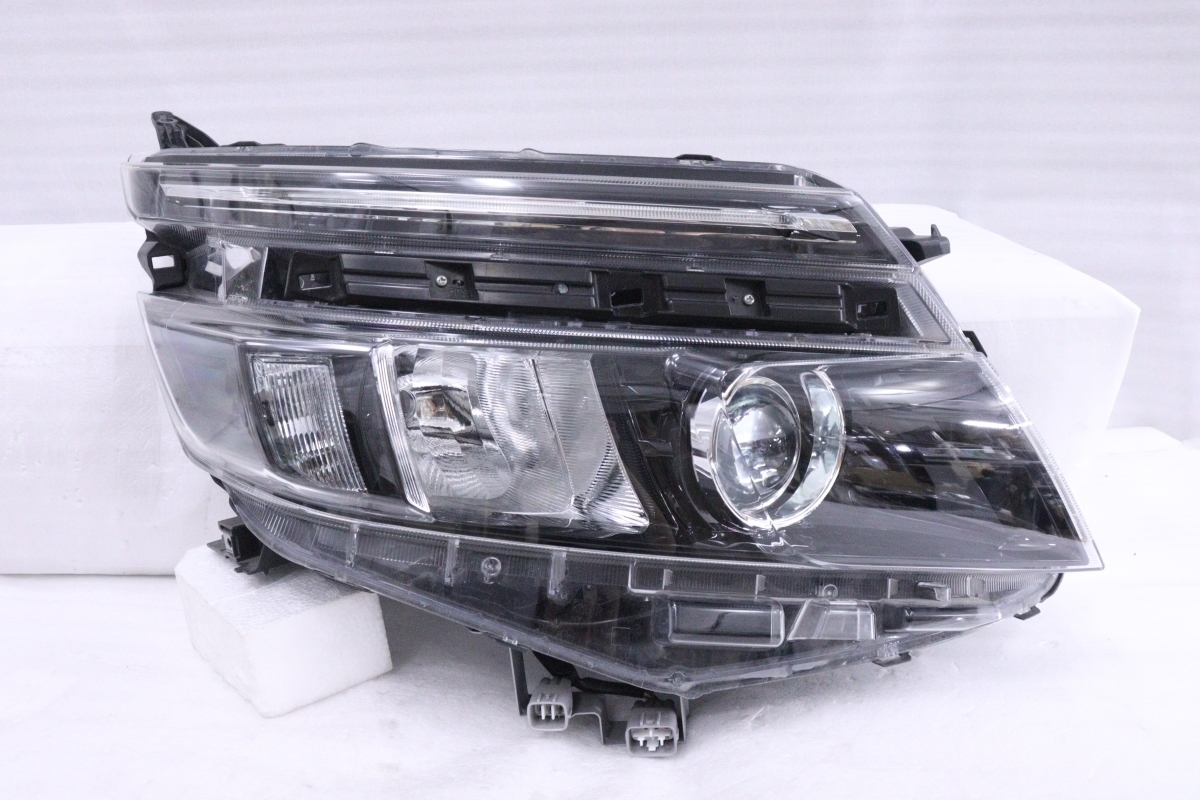 25-1719☆前期 LED ZRR80G ヴォクシー☆右ヘッドライト ICHIKOH 28-229