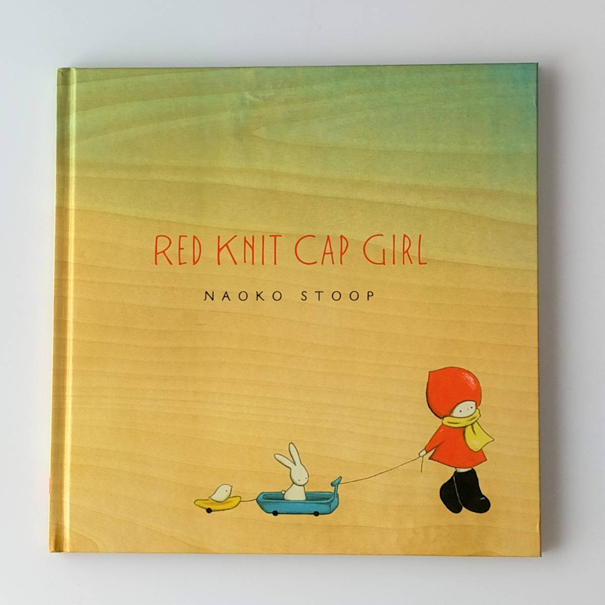 【英語】赤いニット帽の女の子★Red Knit Cap Girl★Naoko Stoop★洋書絵本［31］_画像1