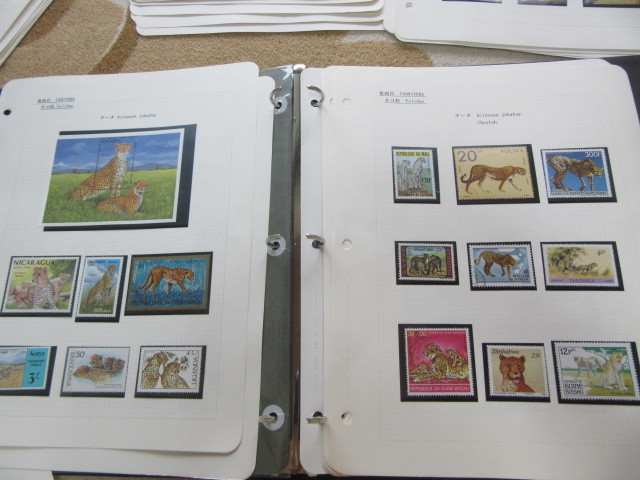 世界各国のヒョウやチーターなどの切手を集めたコレクション 約65リーフ の 大型バインダー _画像2