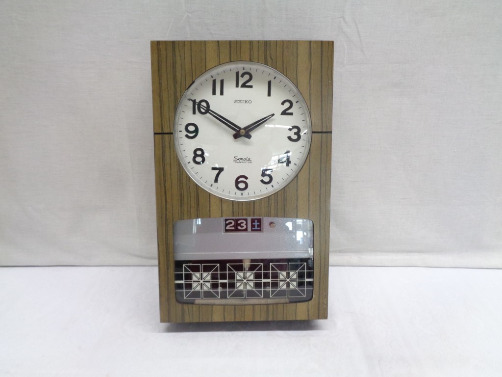 シルバー金具 SEIKO 「Sonola」電池式トランジスタ時計 昭和30年代