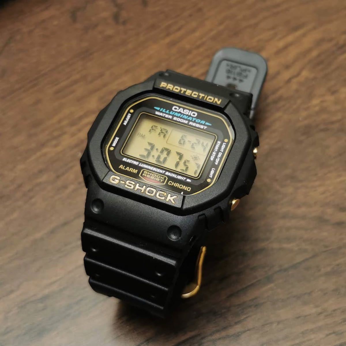 CASIO G-SHOCK DW-5600E ゴールド + メタル遊環 + ワイヤー CASIO G-SHOCK DW-5600E ゴールド + メタル遊環 + ワイヤー