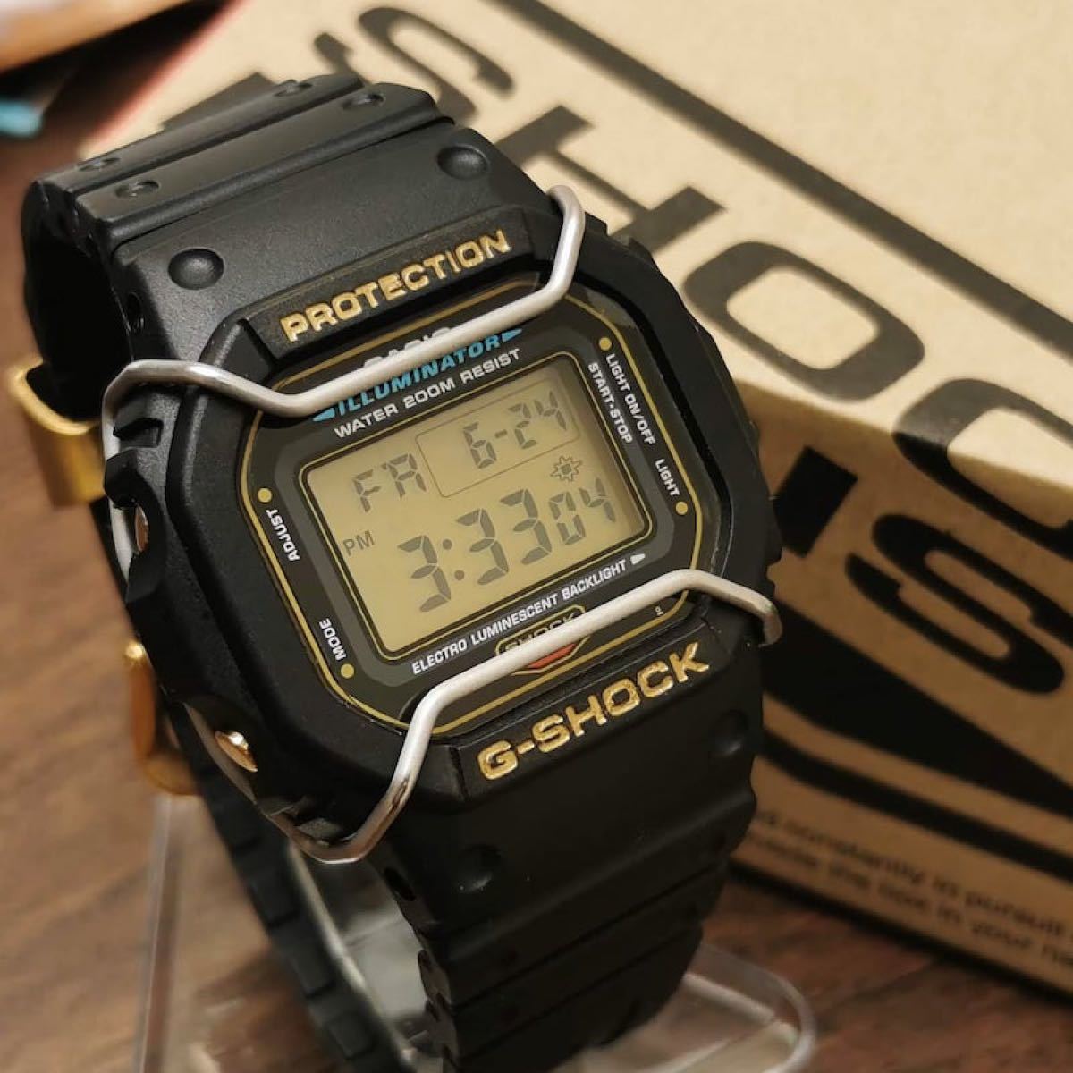 CASIO G-SHOCK DW-5600E ゴールド + メタル遊環 + ワイヤー CASIO G-SHOCK DW-5600E ゴールド + メタル遊環 + ワイヤー
