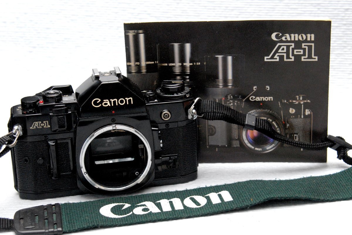 Canon キャノン 昔の高級一眼レフカメラ A-1 ボディ + （取説付）希少な作動品 （鳴き無し）（腐食無し）_画像1