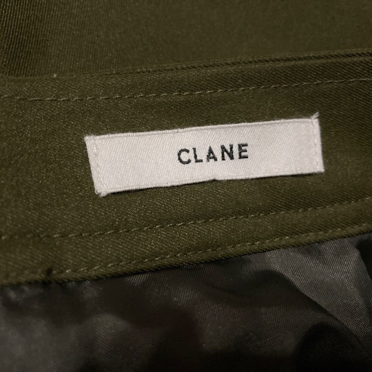 CLANEクラネMILITARY PLEATS DOCKING SKIRTミリタリープリーツ