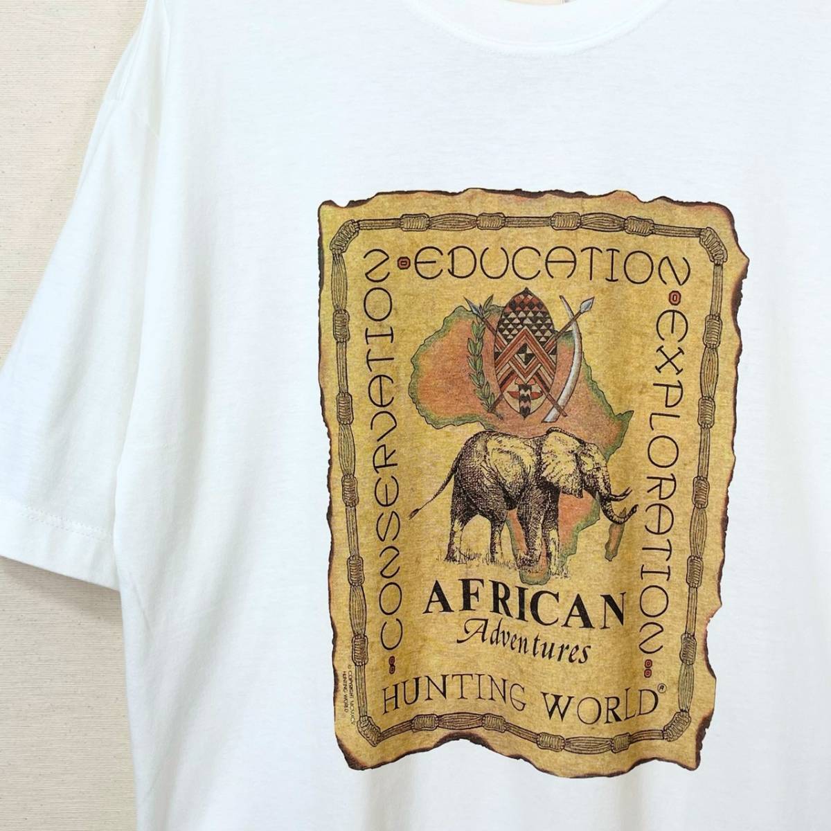 希少《Dead Stock / Made in Italy》80s90s デッド【 HUNTING WORLD AFRICAN PRINT サファリ イタリア製 コットン Tシャツ M ビンテージ 】