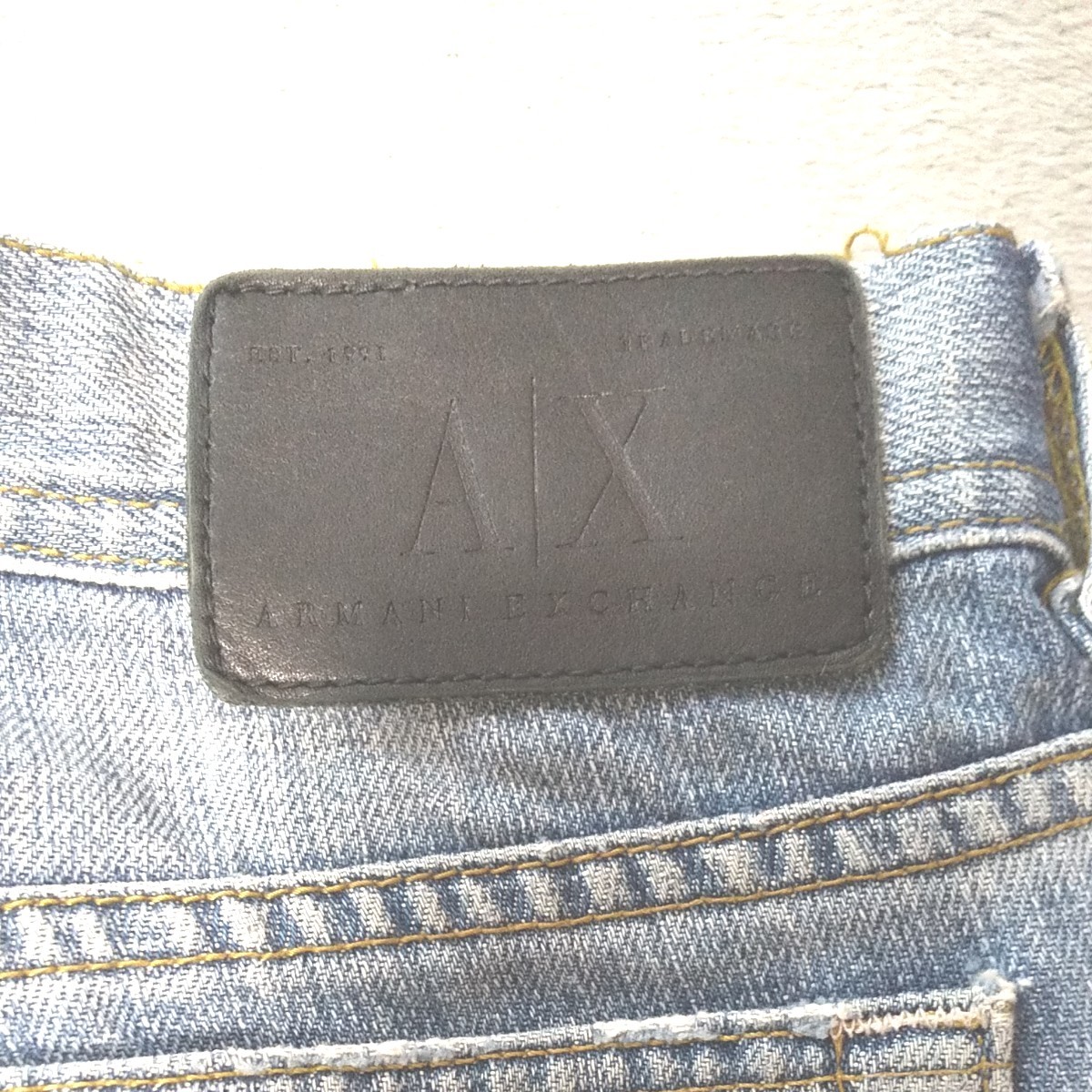 ARMANI EXCHANGE ブーツカットジーンズ