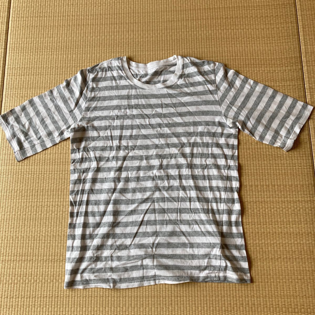 レディースボーダーＴシャツ。Ｌサイズ。グレー、袖やや長め。中古品です。バスト86〜94、身長154〜162cm。破れ無し。シワあり