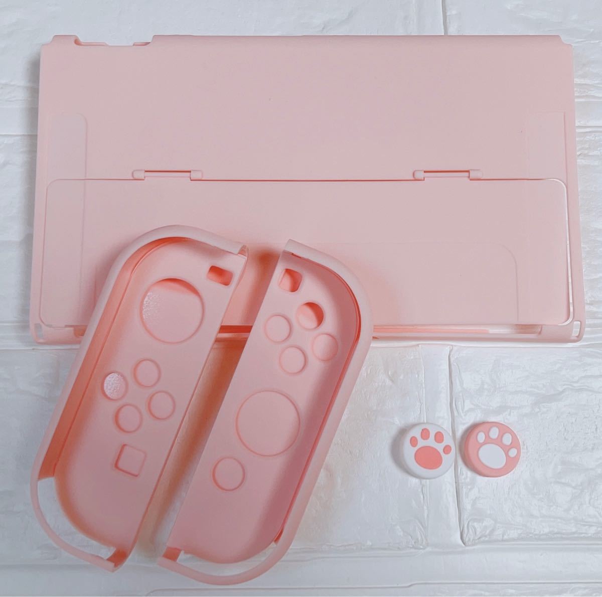 任天堂Switch有機EL専用カバー　スイッチOLEDハードケース　Nintendo ピンク／肉球