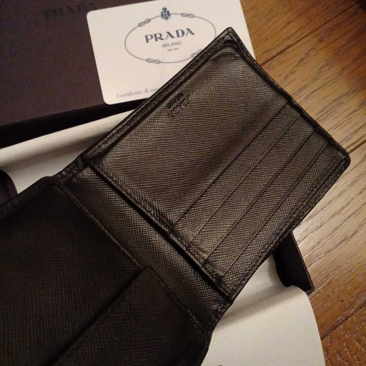 プラダPRADAロゴ型押し 二つ折り財布サフィアーノレザー黒ブラックNERO