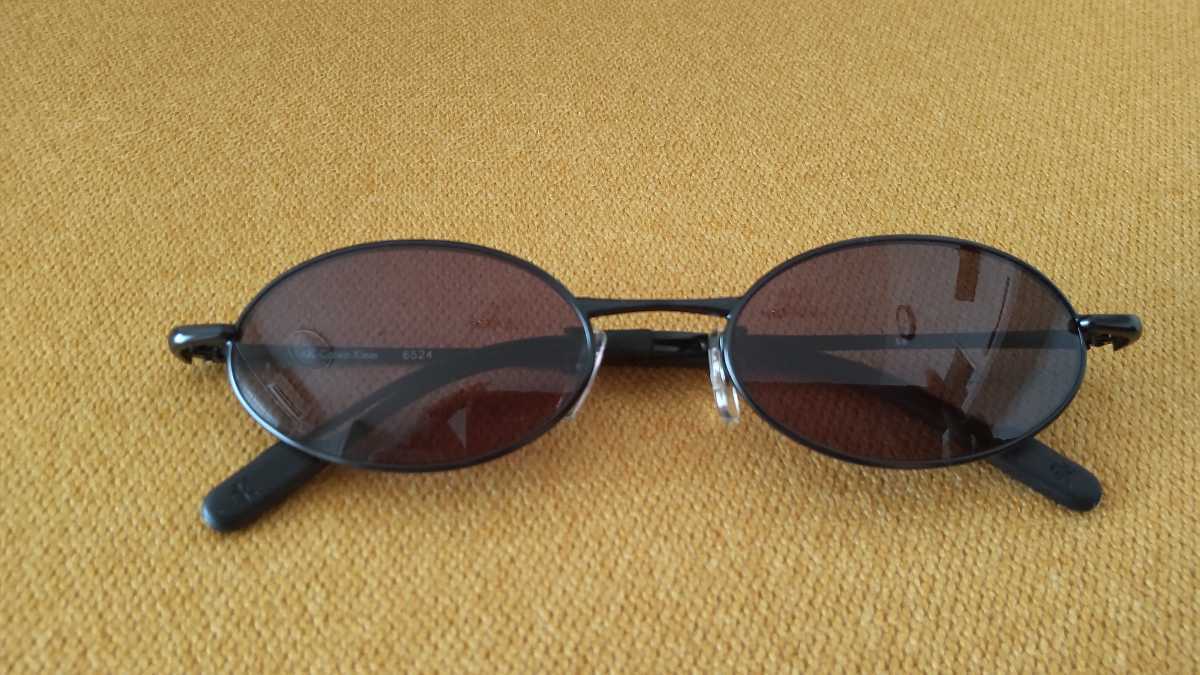 CALVIN KLEIN/ Calvin * Klein солнцезащитные очки чёрный овальный type 
