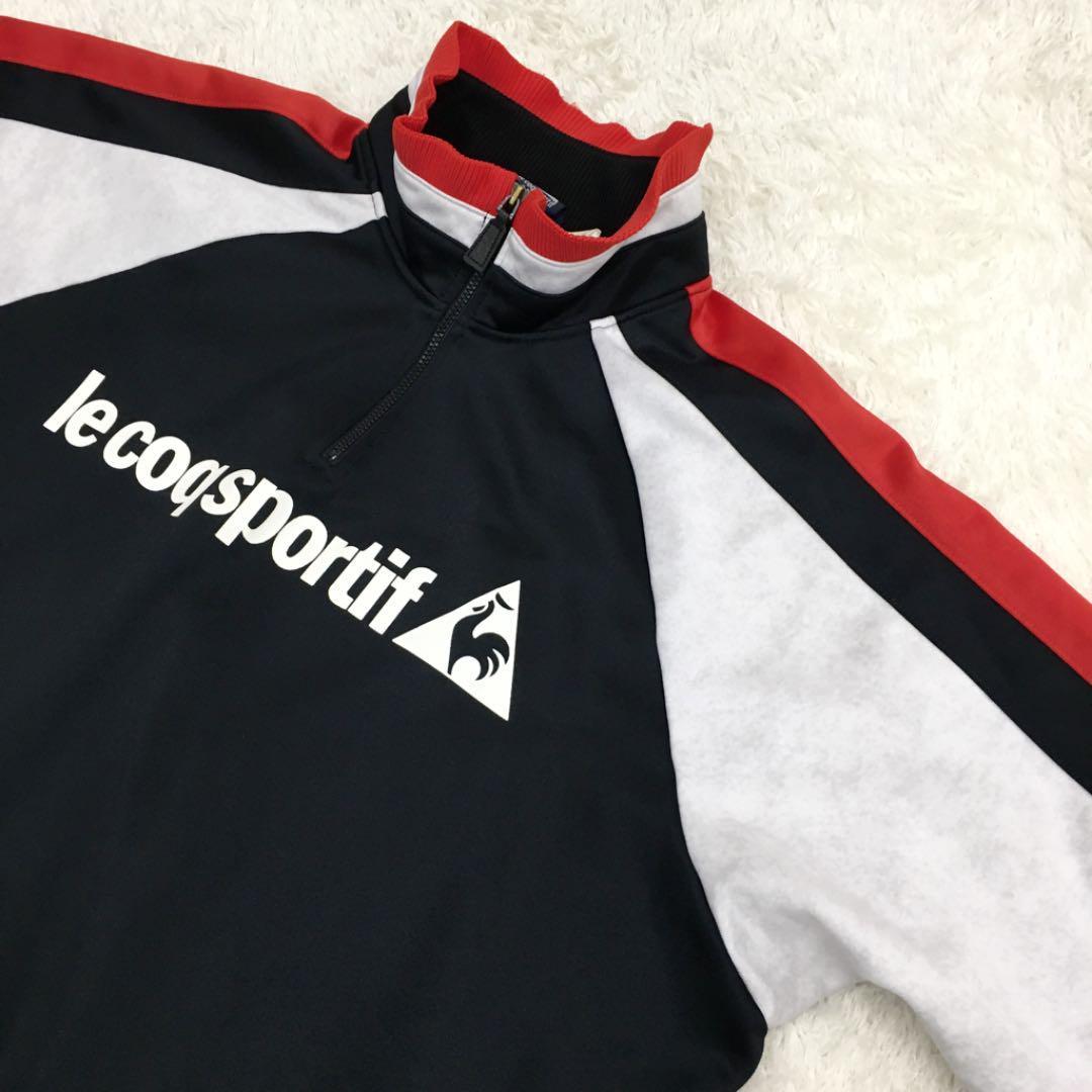 lecoqsportif ルコック スポルティフ スポーツウェア 半袖ジャージ ハーフジップ プルオーバー プリントロゴ メンズ サイズL 黒