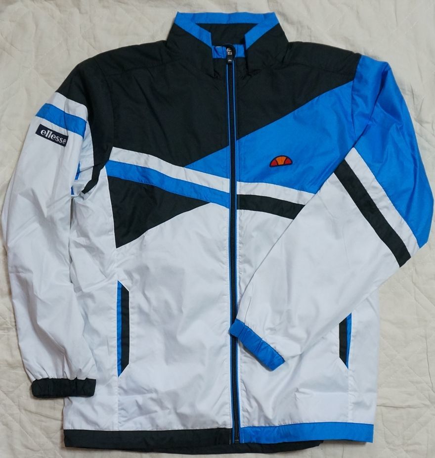 新品 ellesse ウィンドブレーカージャケット　サイズL　青白　エレッセ_画像6