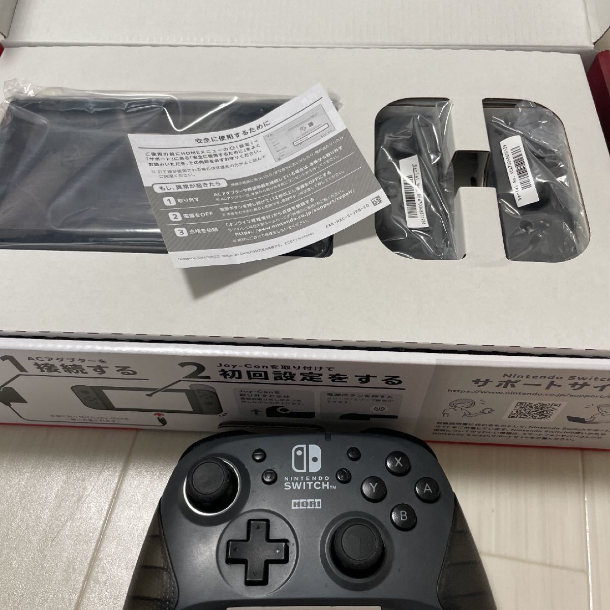 Nintendo Switch 本体とプロコン holdmeback.com