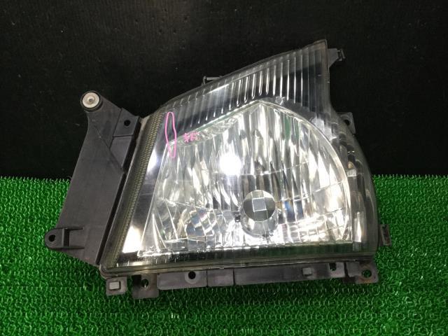 エルフ PB-NKR81AN 左ヘッドランプASSY 729 110-21819_画像1