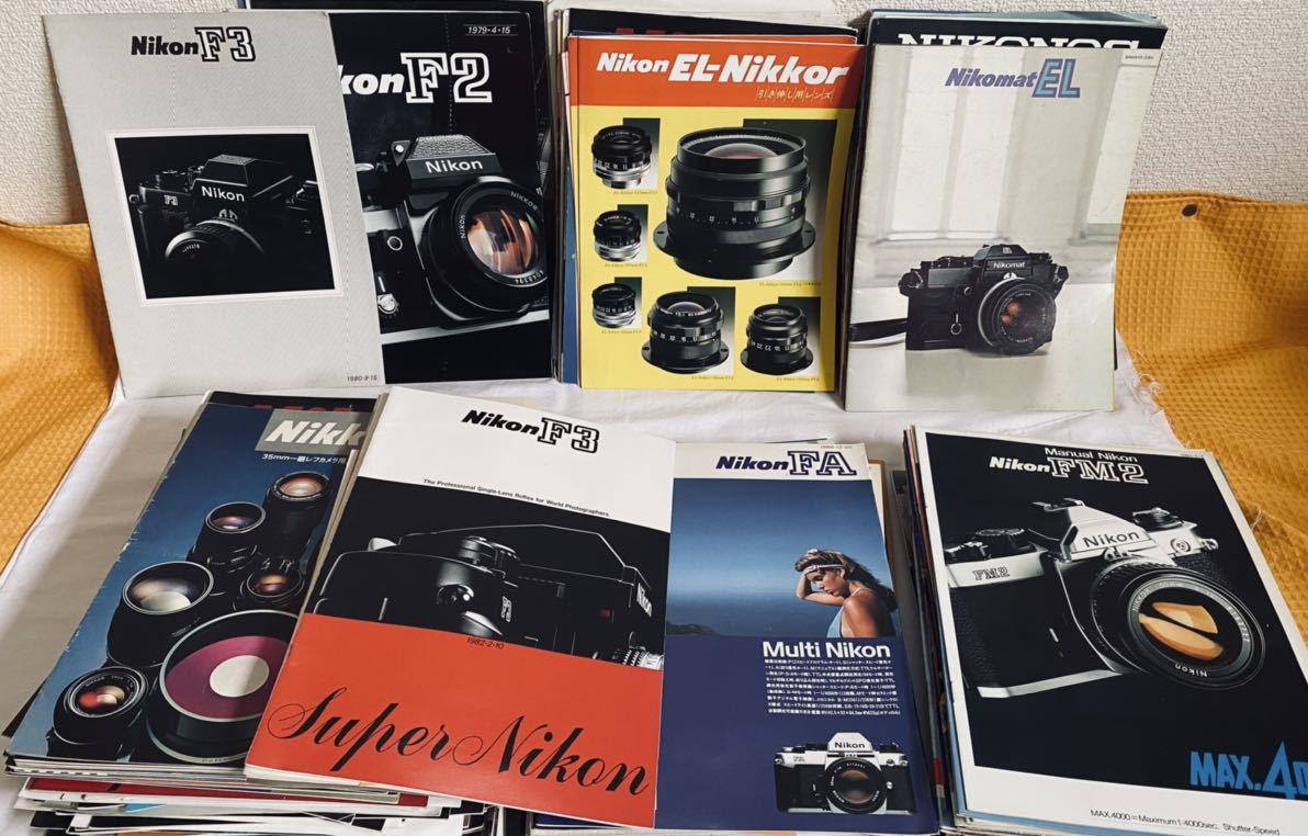 Nikon camera lens. pamphlet 150 part and more 1980 year ~1985 year mania shide .. .