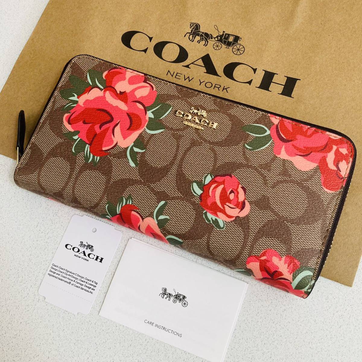 COACHコーチシグネチャー 星 ラウンドファスナー PVC