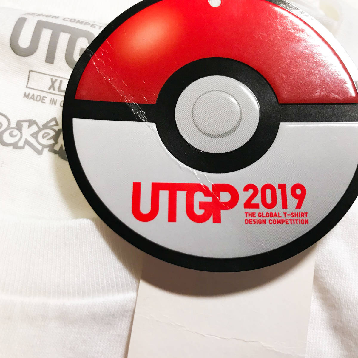 ◆ポケモン◆タグ付き ユニクロ Tシャツ メンズ XL UT GRAND PRIX 2019 レッド_画像2