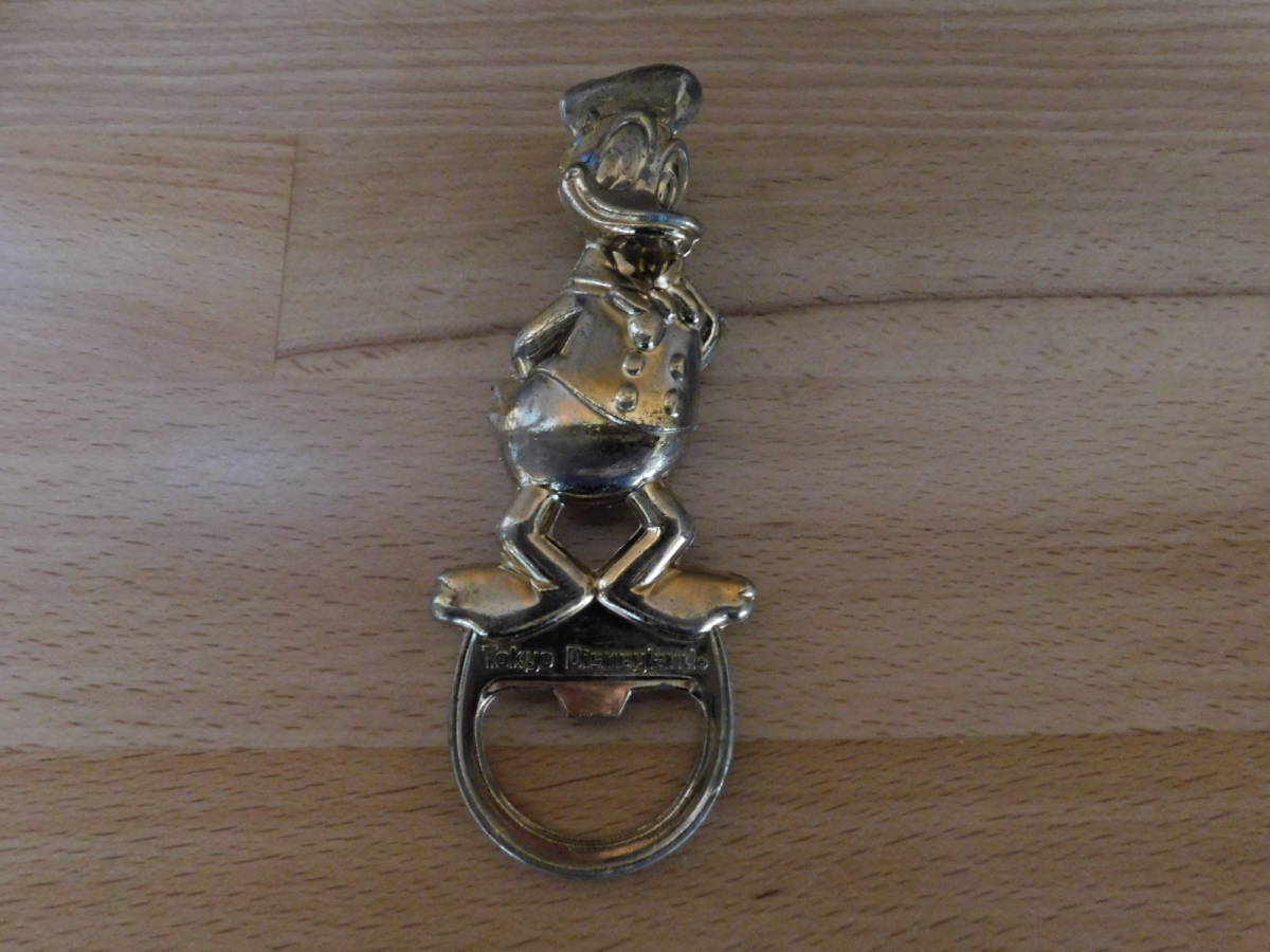 ドナルドダック BOTTLE OPENER 栓抜き Tokyo Disneyland 金色_画像1