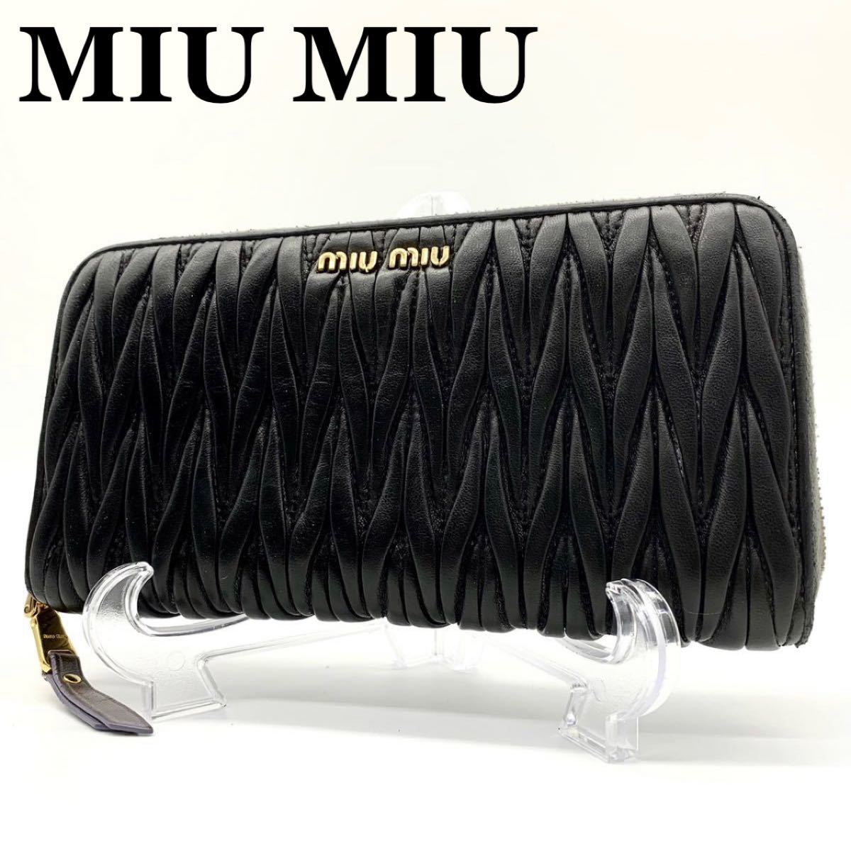 カード miumiu 長財布 ラウンドファスナーの通販 by まうるる☆shop ...