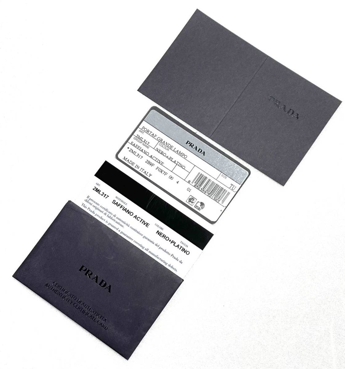 訳あり品 新品未使用PRADA/プラダ2ML317ラウンドファスナー長財布正規