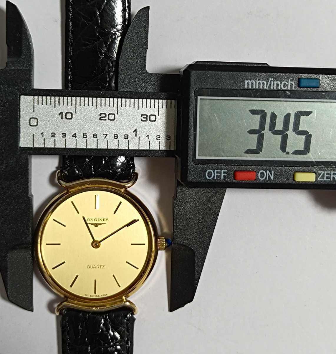 いします LONGINES メンズ腕時計 ゴールド文字盤 三針デイト付きの通販 