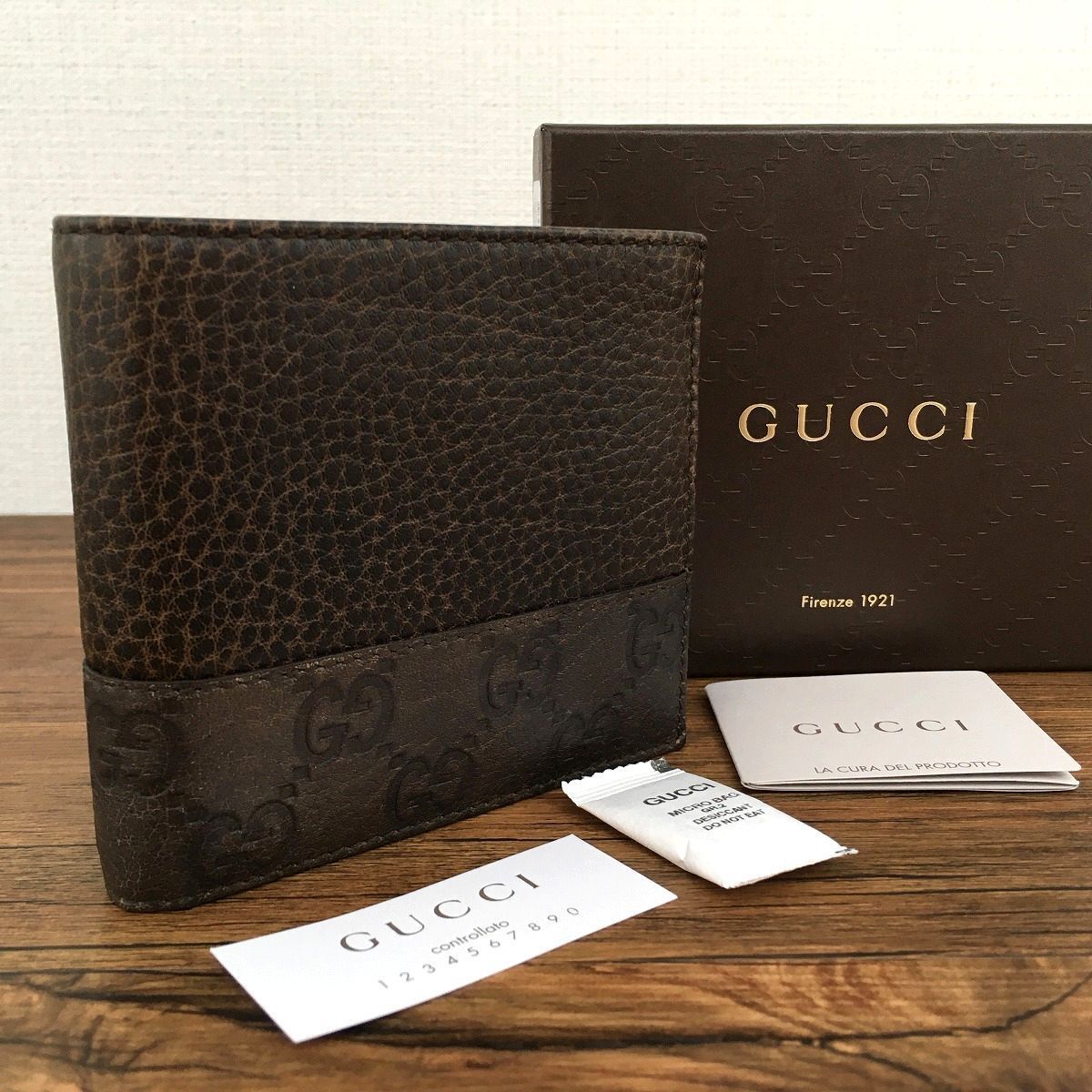 ☆送料無料☆ 未使用品 GUCCI 二つ折り財布 256418 ブラウン シマライン 箱付き グッチ 135_画像1