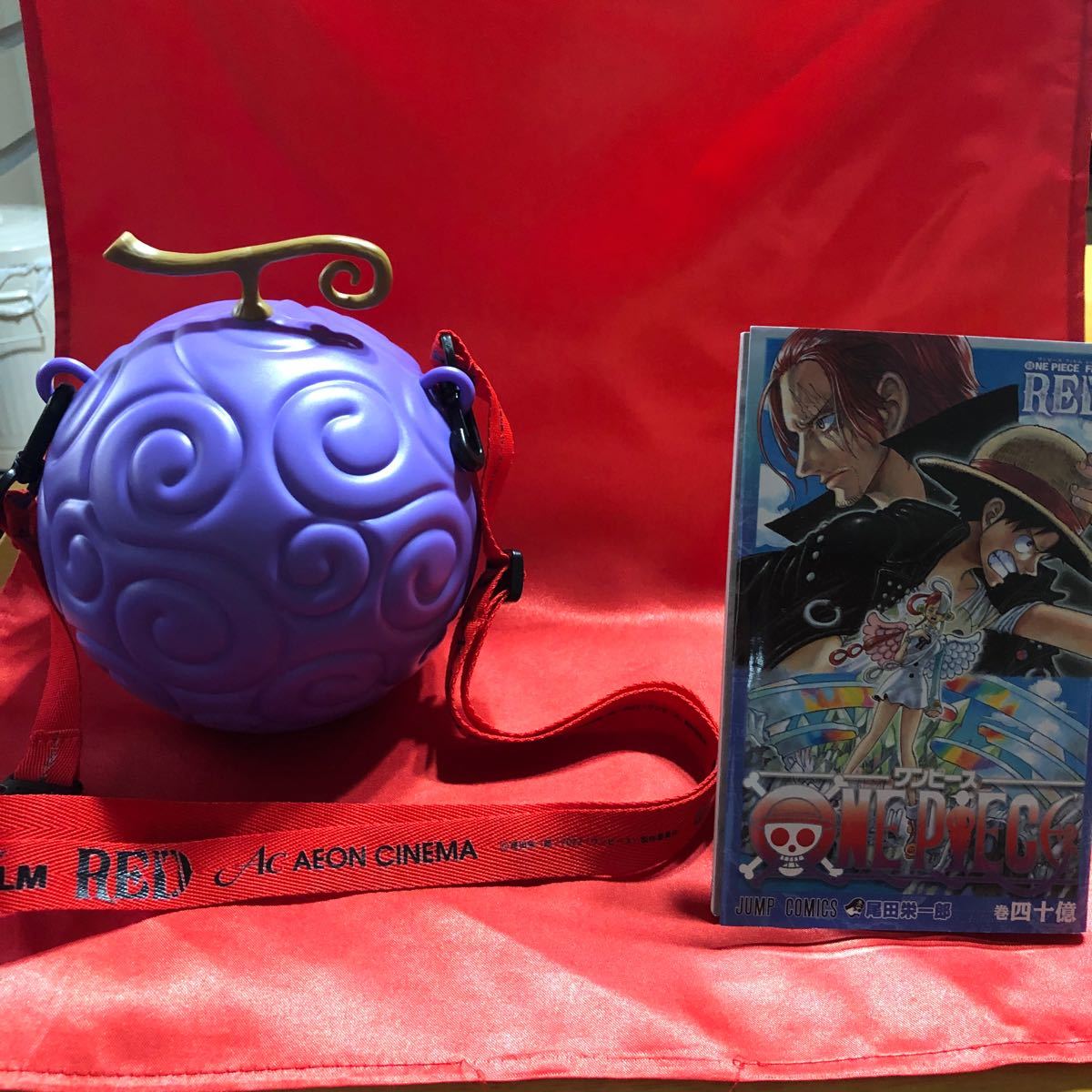 ワンピースfilmRED劇場限定グッズ ゴムゴムの実ポップコーン、ワンピース40億巻〔入場特典第1弾〕2点セット