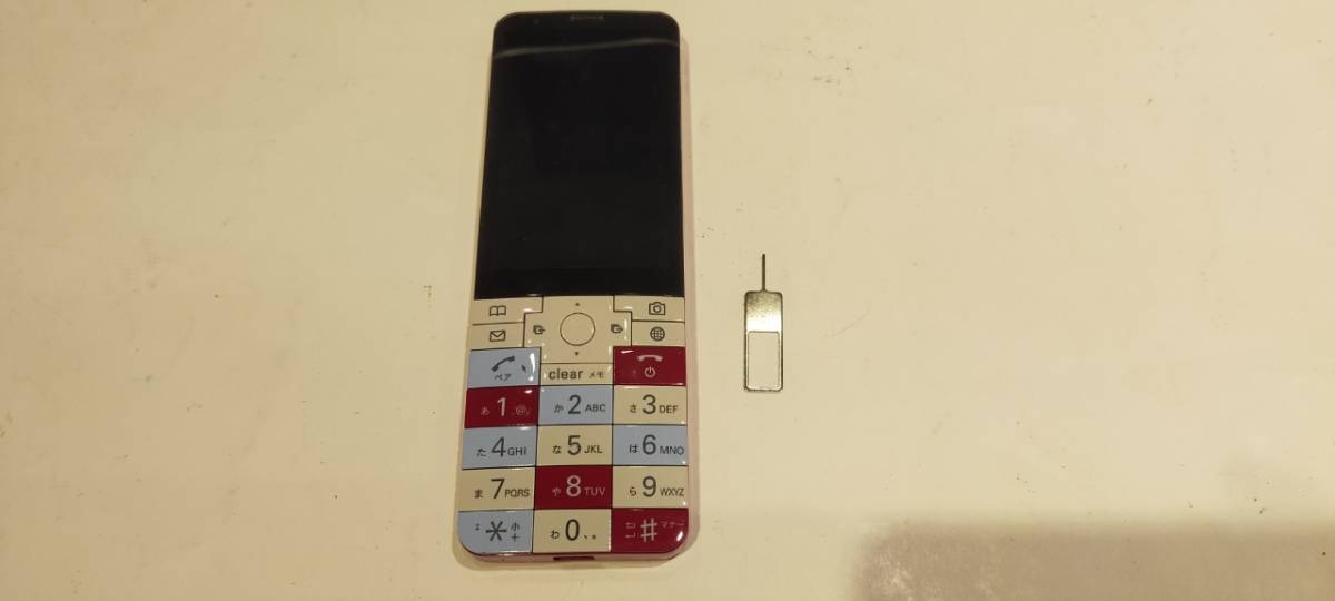 au KYOCERA INFOBAR xv KYX31 ニシキゴイ 判定○ SIM取り出しピン有 良品 京セラ インフォバー NISHIKIGOI 52972_画像1