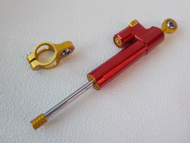 B goods special price *0*1 point only! all-purpose high quality for motorcycle steering damper red × gold 4-8/3(3)