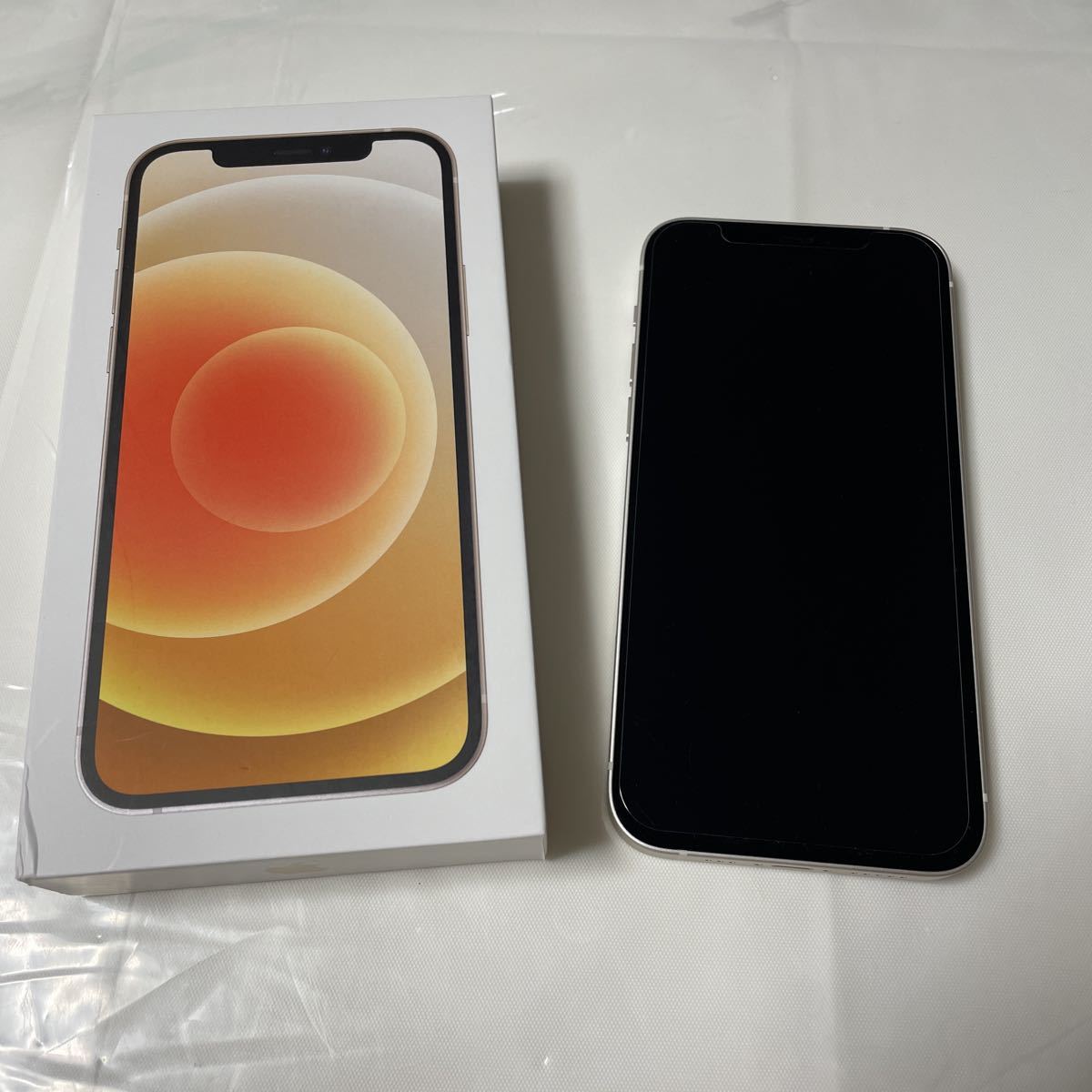 iPhone 12 64GB ホワイト 本体SIMフリー(SIMロック解除済み) 新品 au ...
