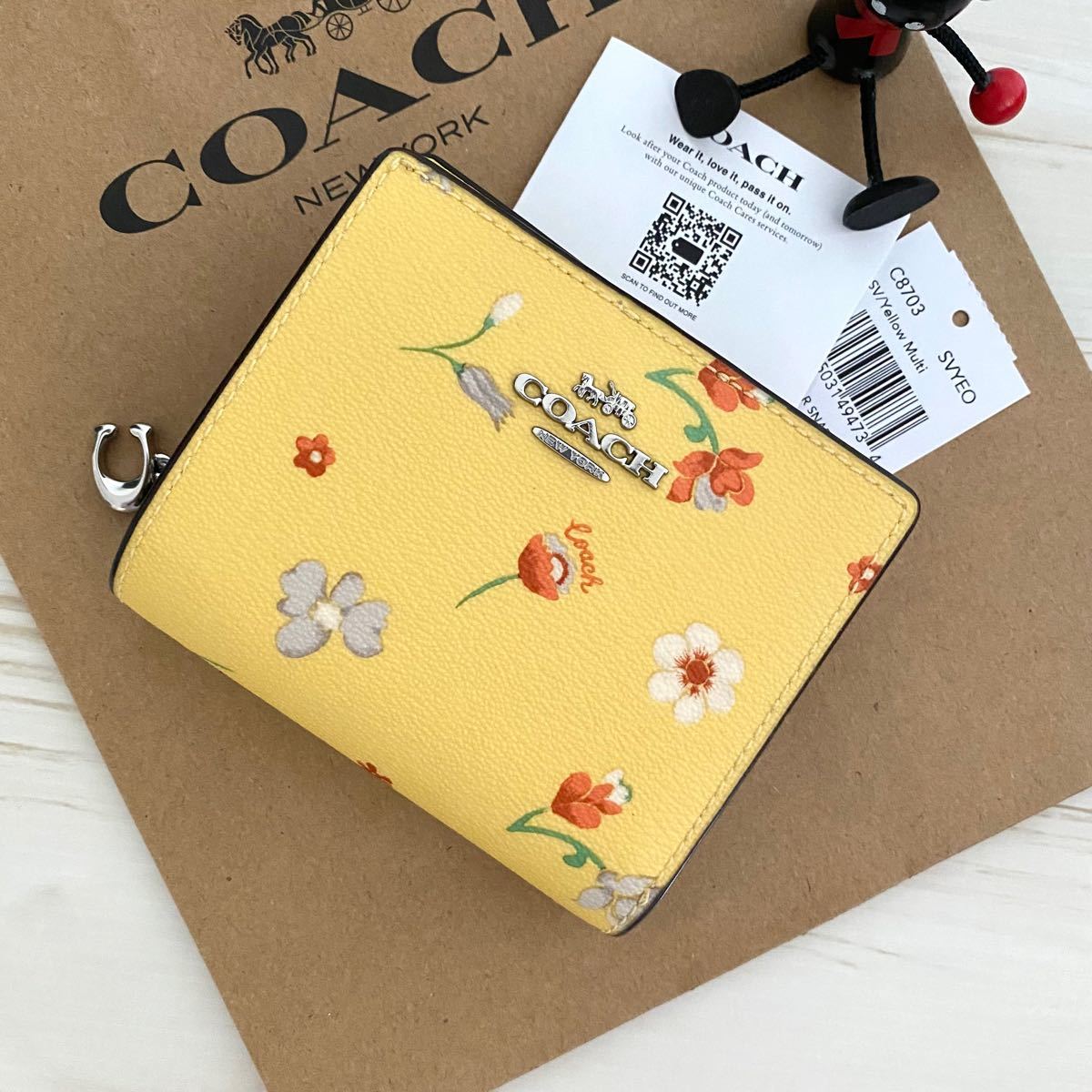 超最新作限定品 新品 COACH コーチ 折り財布 花柄 イエロー