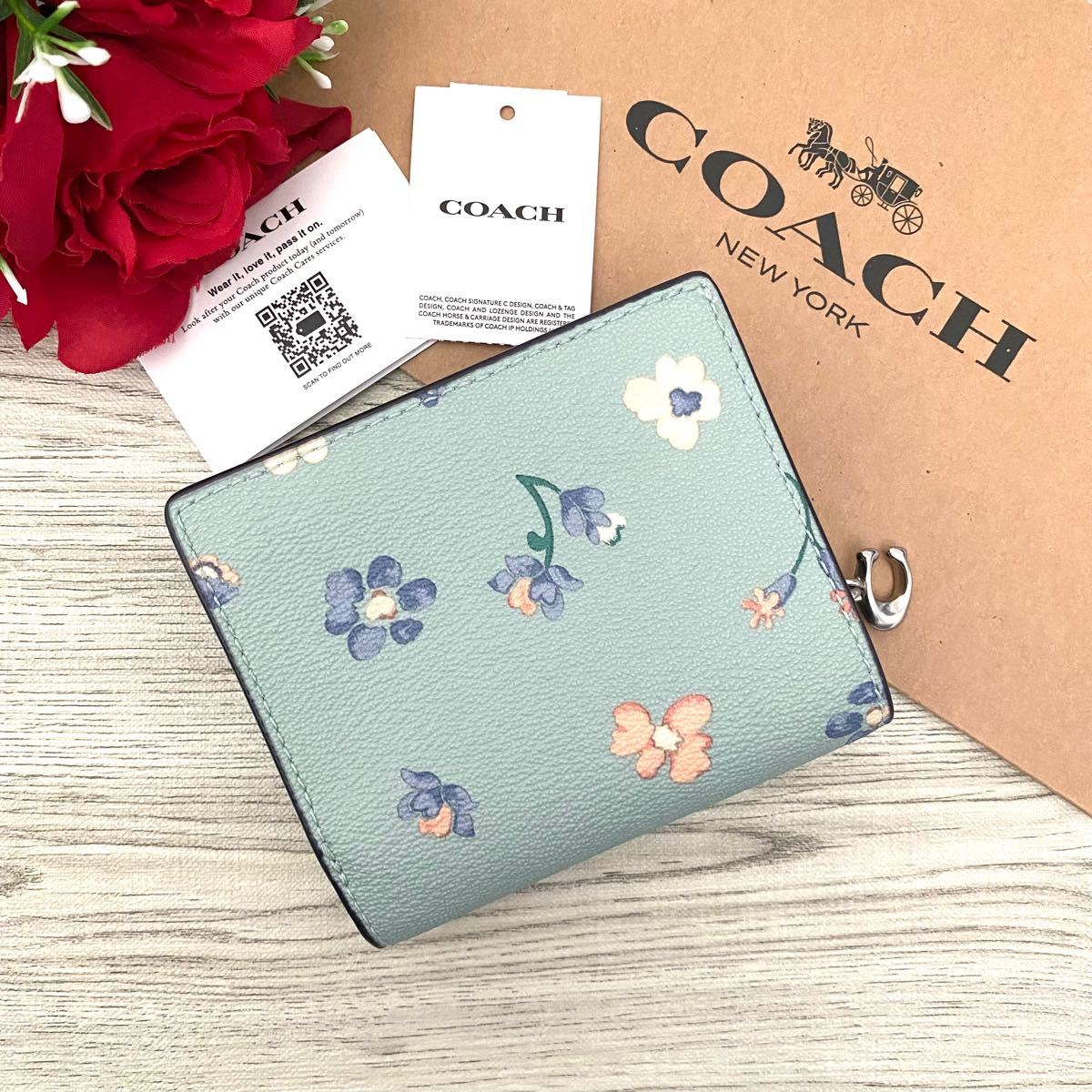 □販売限定□ COACH コーチ 二つ折り 花柄 水色 レディース
