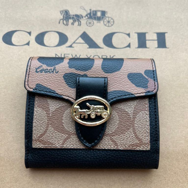 新品　未使用品　コーチ　COACH ミニ財布　コンパクト財布　アウトレット品　豹柄_画像1