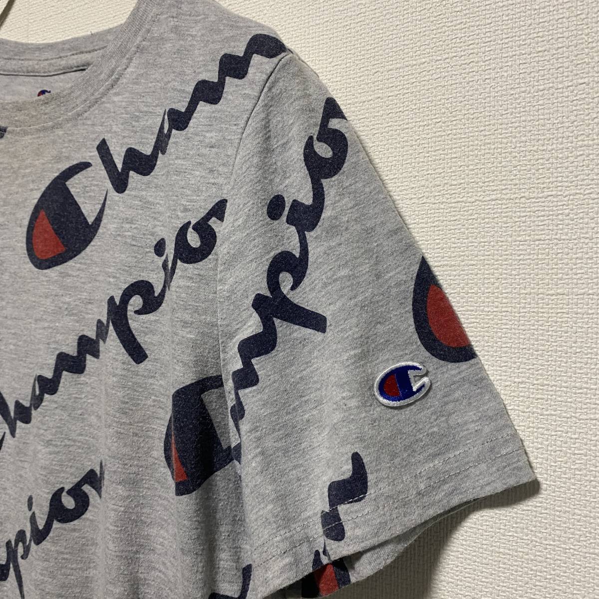 アメリカ古着　champion チャンピオン　半袖Tシャツ　総柄　ロゴ　グレー　【E55】_画像7