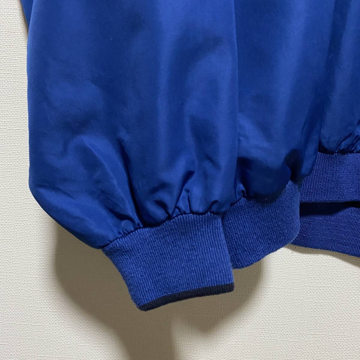 アメリカ古着　プルオーバージャケット　ブルー　ポリエステル　無地　刺繍　【Z51】