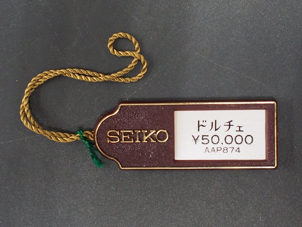 セイコー SEIKO ドルチェ DOLCE オールド クォーツ 腕時計用 新品販売時 展示タグ プラタグ 品番: AAP874 cal: 7731_画像1