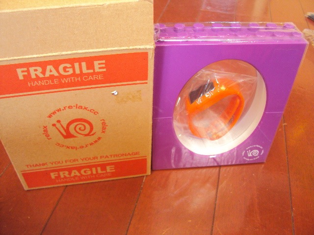  unused goods!re-lax. clock orange!