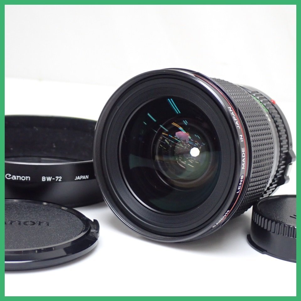 □Canon/キャノン 単焦点レンズ New FD 24mm F1.4L/MF/前後キャップ・フード付き&1787800001_画像1