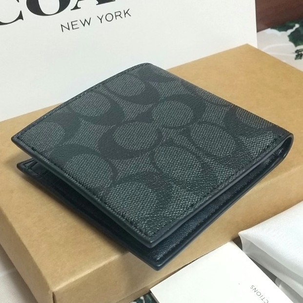 新品】 COACH コーチメンズ 二つ折り財布【ブラック】 シグネチャー