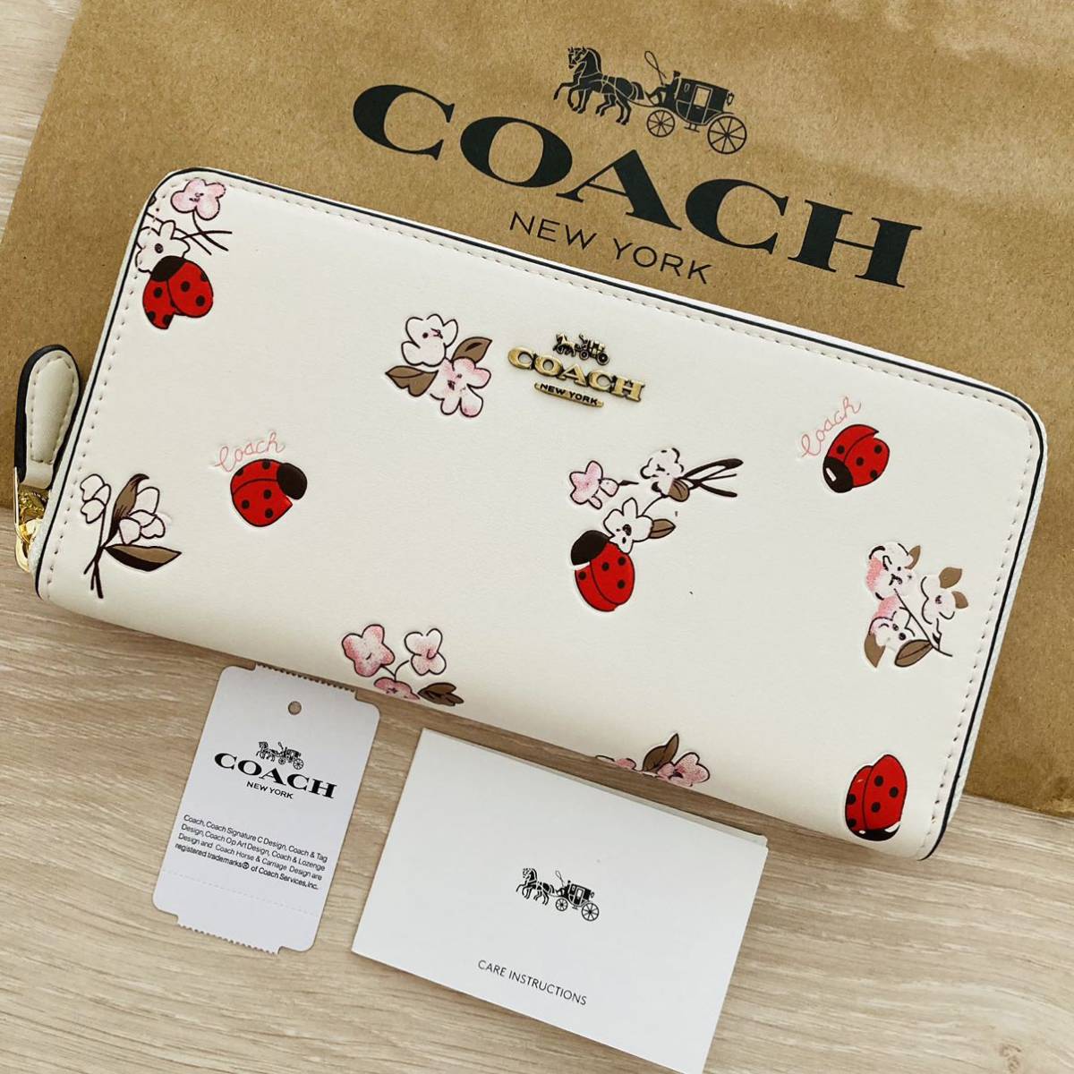 COACH 長財布 コーチ 花柄フローラルプリント アコーディオンジップ