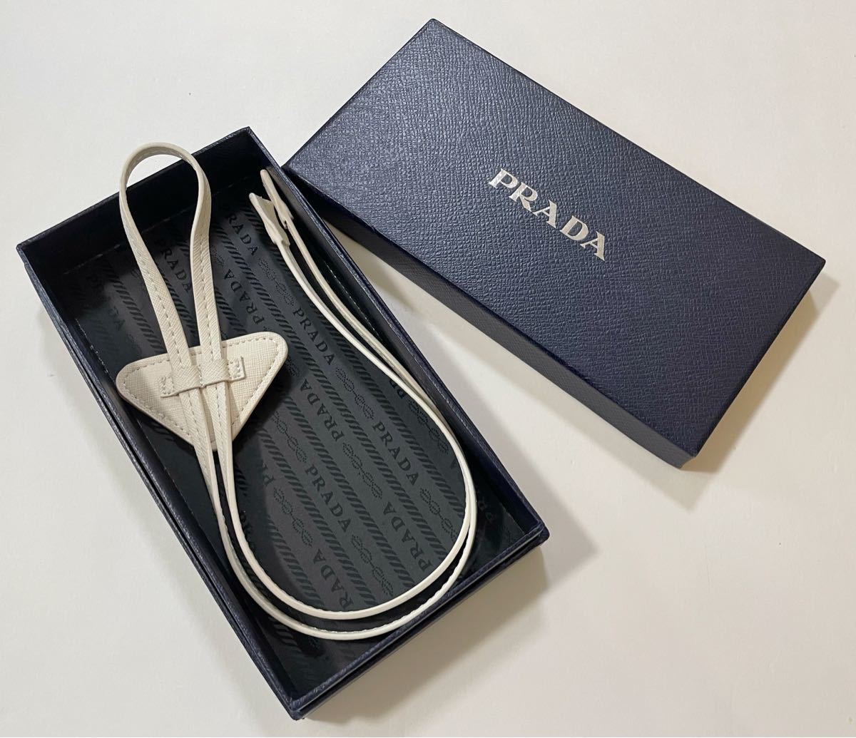 Prada Saffiano Leather Bolo Tie Chalk White