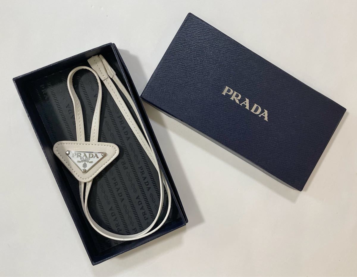 未使用 PRADA プラダ ネクタイ ループタイ 白 ホワイト 三角ロゴ 未使用 PRADA プラダ ネクタイ ループタイ 白 ホワイト 三角ロゴ