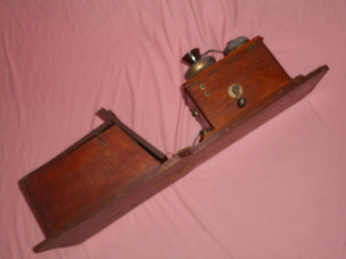  war front telephone machine * wooden hand around .* battery attaching *. electro- vessel *