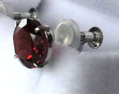  platinum *7 millimeter natural garnet. simple earrings ***